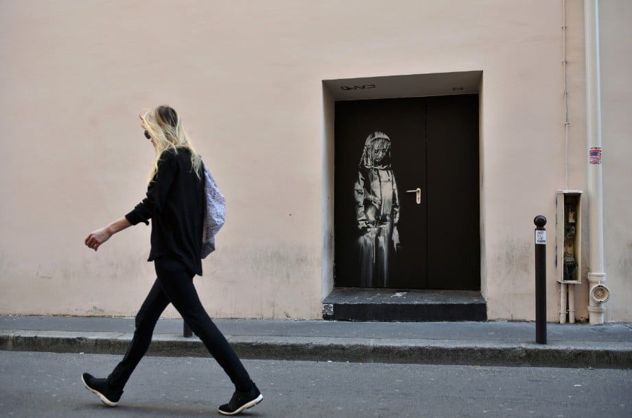 Banksy's tribute to terror attack victims stolen from the Paris Bataclan Theatre