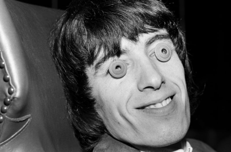 Rolling Stones member Bill Wyman jokes around, 1965