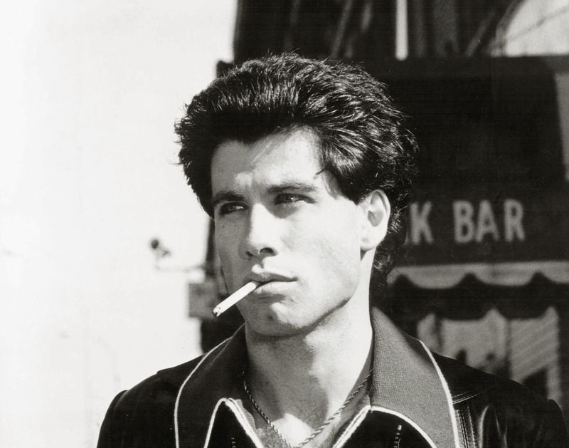 does john travolta smoke cigarettes in real life John Travolta's 10 best films ranked in order of greatness