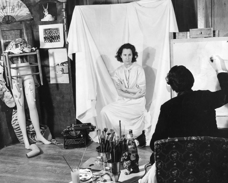 Spanish artist drawing wife Gala