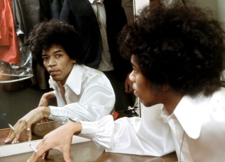 JIMI HENDRIX in his dressing room at the Saville Theatre, London, in June 1967.