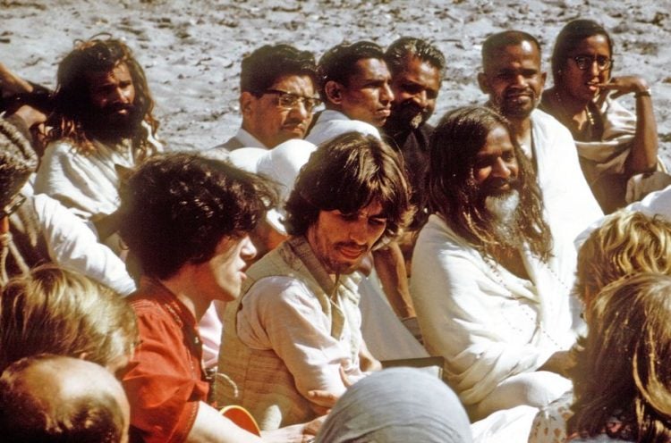George Harrison with the Maharishi at right in India in 1968