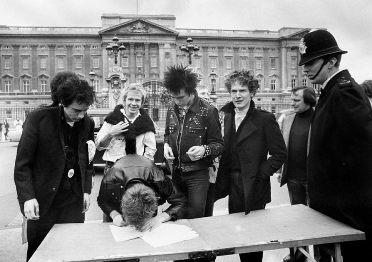 Sex Pistols, signing a new recording contract with A&M Records outside Buckingham Palace in London
