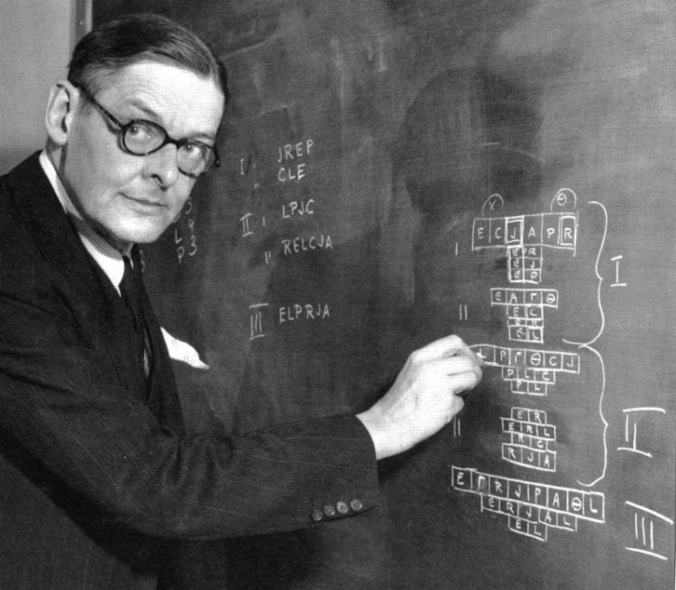T.S. ELIOT (1888-1965) Anglo-American writer and poet about 1943 drawing a diagram