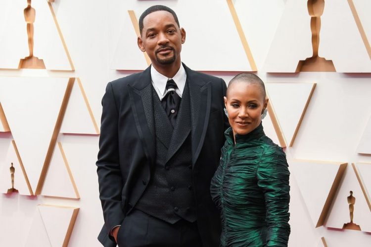 Will Smith and Jada Pinkett Smith walking on the red carpet at the 94th Academy Awards