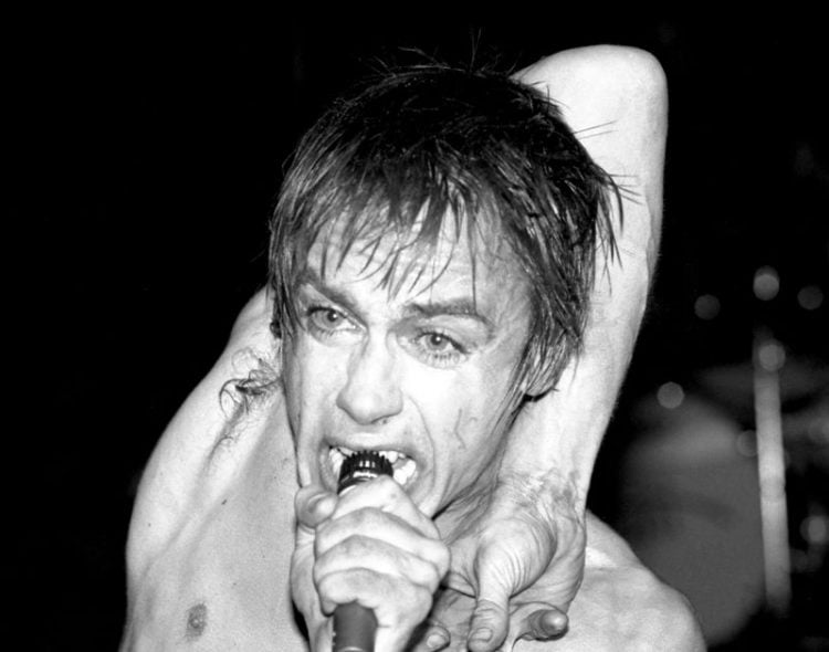 Iggy Pop performs onstage at the Palladium theater in New York City in October, 1977. -