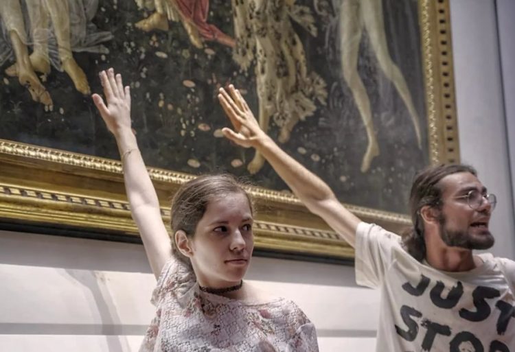 Climate Change activists glue themselves to a Sandro Botticelli painting in Itlay