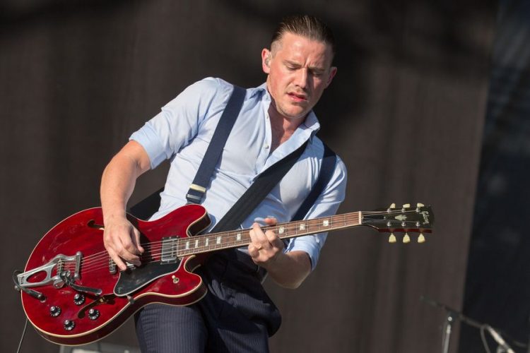 Guitarist JAMIE COOK of the band Arctic Monkeys performs live