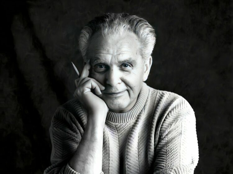 Photo of Jack Kirby taken by Susan Skaar during a session in the studio at Jack's home in Thousand Oaks, CA. The photos were later published in The...