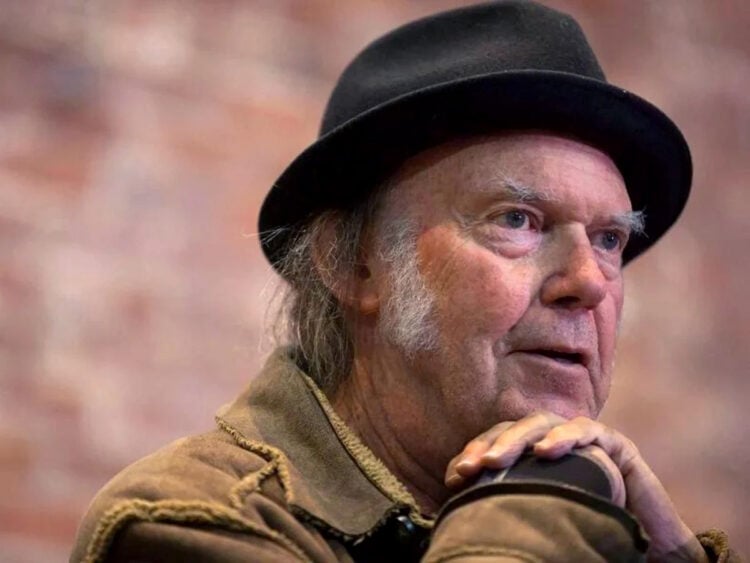 Neil Young speaks during a news conference in Vancouver, British Columbia, on Monday, Nov. 23, 2015