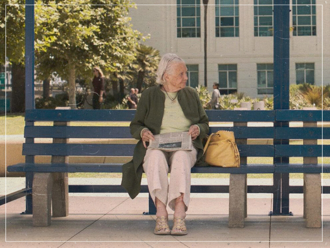 In 'Barbie', who is the woman on the bench?