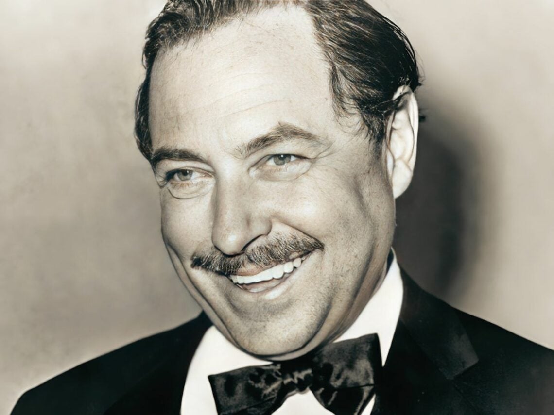 Tennessee Williams, American playwright; cropped from photo of Williams with cake for 20th anniversary of "The Glass Menagerie"