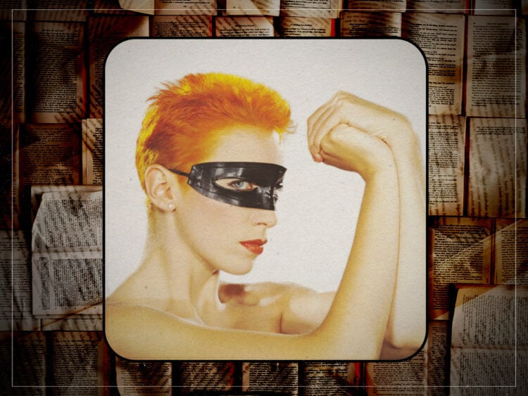 Why on earth is Annie Lennox reading books back to front