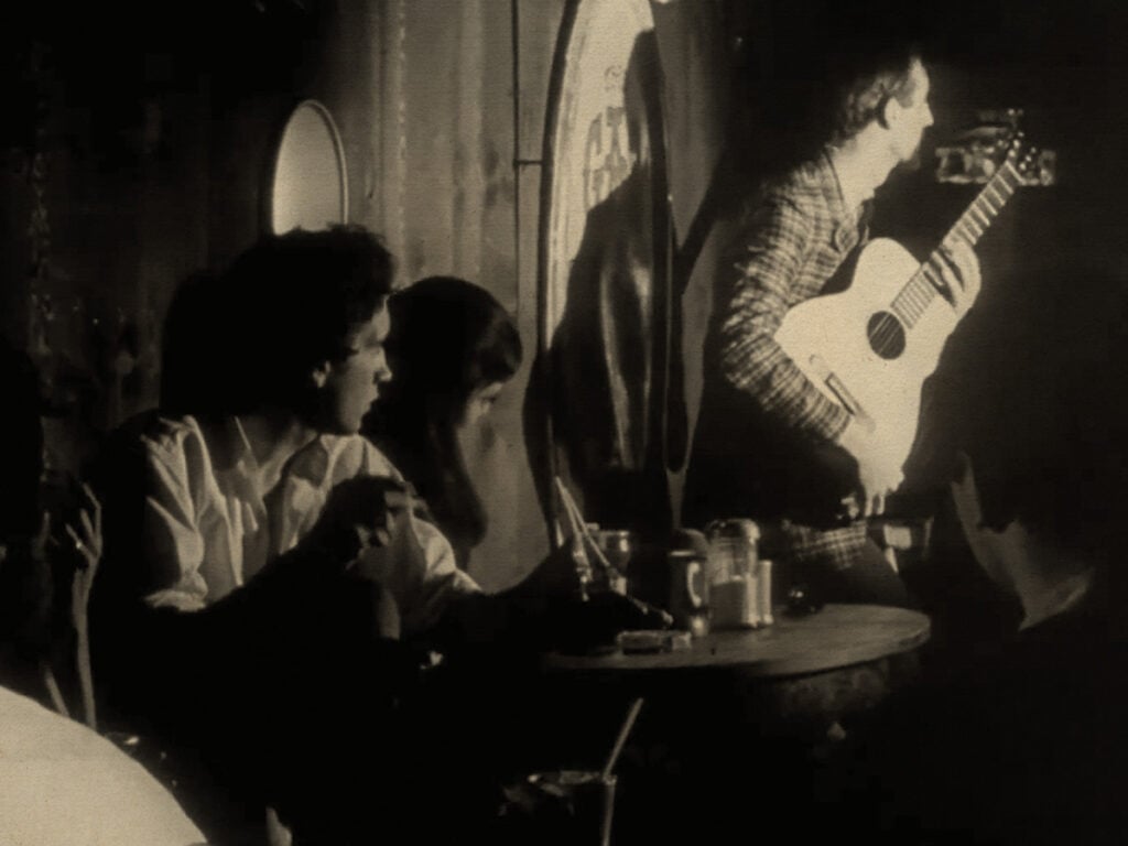 Punters watching Noel Paul Stookey performing at The Gaslight Café - 1962.